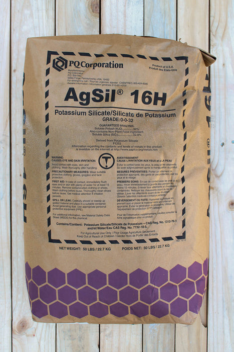 A 50 lb bag of PQ Corporation AgSil 16H potassium silicate fertilizer, featuring a brown kraft paper bag with a purple honeycomb pattern at the bottom, displayed on a light wood plank background.