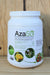 A white plastic tub of AzaSol Non-Oil Based, Water Soluble Powder, featuring a white cap and a detailed white label with green accents and botanical imagery, set against a rustic wooden background.