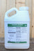 A 1 gallon white plastic jug of Biomin Boron fertilizer, featuring a green and white label, set against a rustic wooden plank background.
