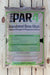 A bag of 2-14-0 PAR4 Granulated Bone Meal fertilizer, a natural nitrogen and phosphate fertilizer, displayed on a light-colored wooden plank background.