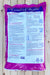 A large bag of OMRI Coast of Maine Potting Soil, featuring a white and purple label, photographed flat on a light-colored wooden plank background.