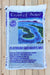 A 1.5 cu ft bag of Coast of Maine Stonington Blend Platinum Grower's Mix for potted and container plants, placed on a light-colored wooden surface.