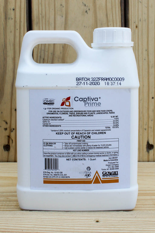 A white plastic jug of Gowan Captiva Prime, featuring a detailed product label, set against a rustic wooden background.