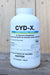 A white plastic bottle of CYD-X Insecticidal Virus, set against a rustic wooden background.