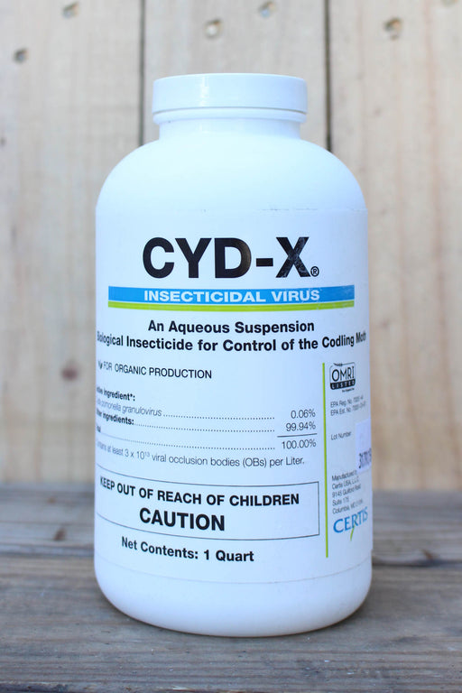 A white plastic bottle of CYD-X Insecticidal Virus, set against a rustic wooden background.