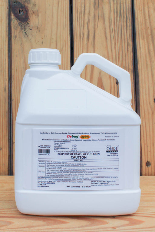 A white plastic jug of Debug Optimo, displayed on a wooden surface against a wooden plank background.