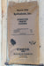 A 50 lb paper bag of Mason City By-Products, Inc. Hydrolyzed Poultry Feathers, displayed against a light wood plank background.