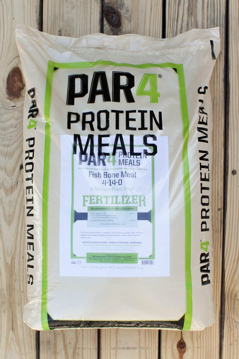 A bag of PAR4 Protein Meals Fish Bone Meal fertilizer placed on a light-colored wooden plank surface. 