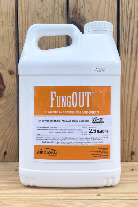 A 2.5 gallon white plastic jug of Fungout Fungicide and Bactericide Concentrate, set against a rustic wooden plank background.