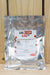 A silver pouch of LalStop G46 WG, featuring a white label with red and black text, set against a light wood plank background.