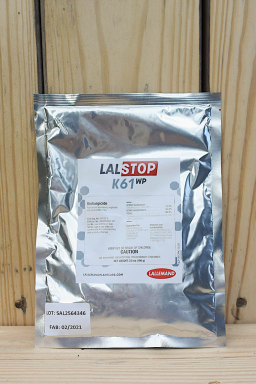 A silver foil pouch of LALSTOP K61 WP by Lallemand, displayed against a light wood panel background.