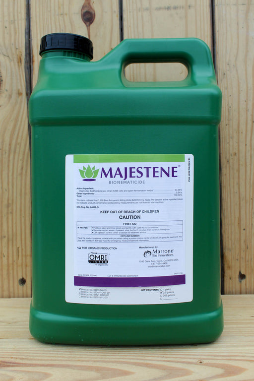 A green plastic jug of Majestene Bionematicide with a black cap and a white product label, set against a rustic wooden plank background.