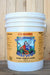 A 5 gallon white plastic bucket of Neptune's Harvest Organic Fish Fertilizer, 2-4-1, featuring a yellow label with a colorful cartoon illustration of Neptune, set against a rustic wooden background.