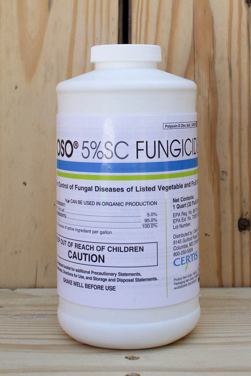 A white plastic bottle of OSO 5% SC Fungicide standing on a wooden surface against a wooden plank background.