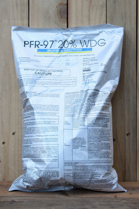 A large white plastic bag of PFR-97 20% WDG microbial insecticide, standing upright against a rustic wooden plank background.