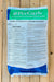 A large plastic bag of PerCarb Broad Spectrum Bactericide/Fungicide, featuring a green and blue header with white text, displayed on a light-colored wooden plank background.