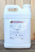 A large white plastic jug of Venerate Bioinsecticide standing against a light wood plank background.